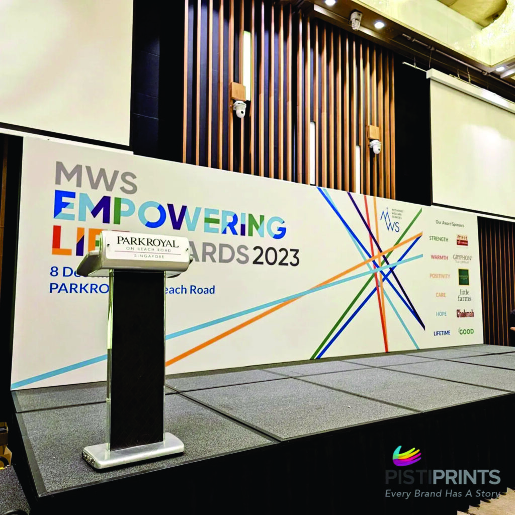 Seamless stage setup and premium event branding tailored for your corporate gatherings.